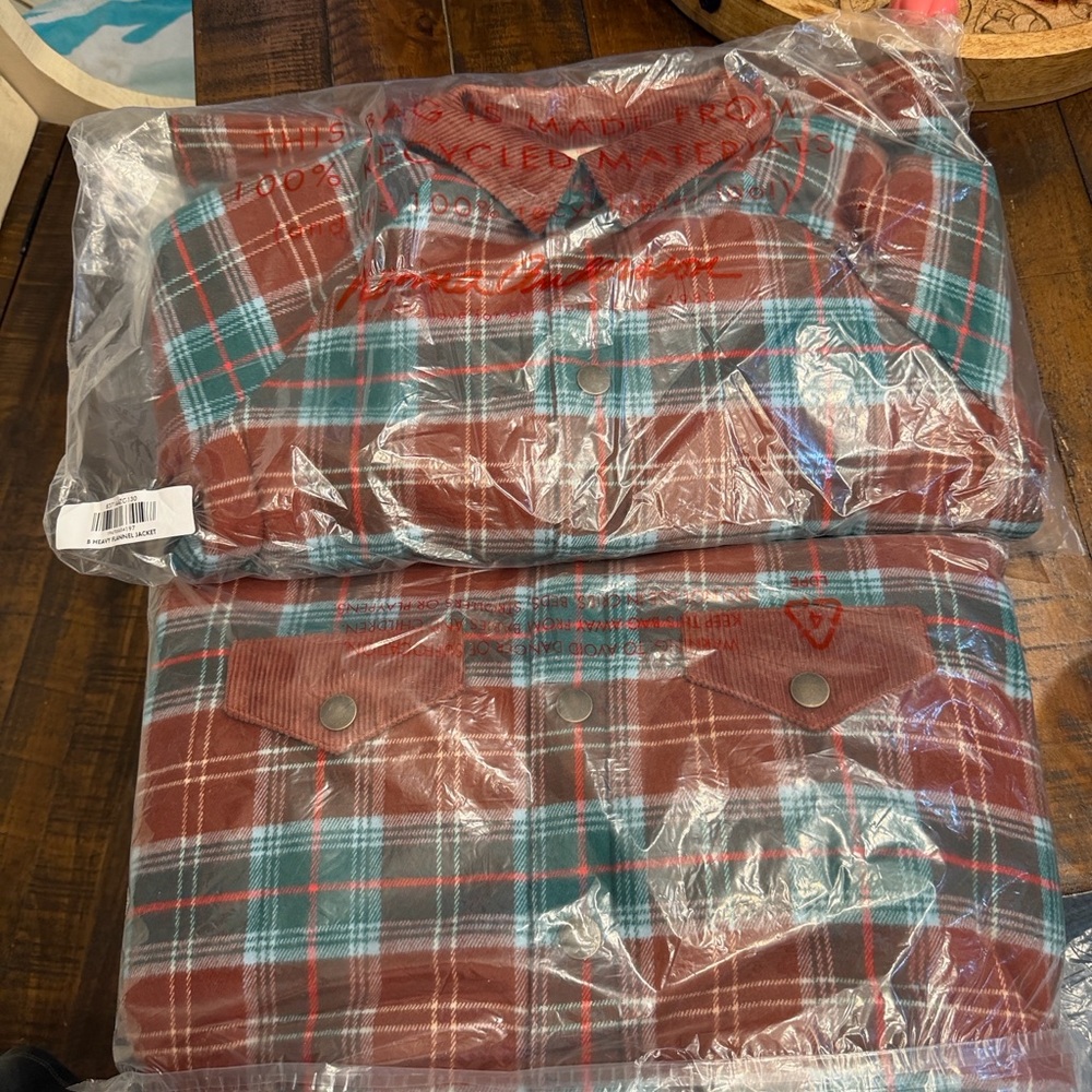 Stylish kids jacket in a brown and teal plaid